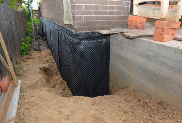 Happy homeowners after waterproofing job in Notasulga